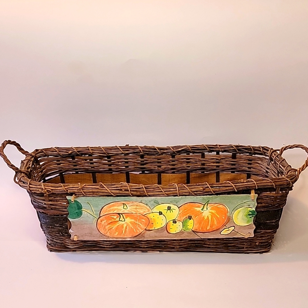 Basket with pumpkins and fall colors, handles on each end